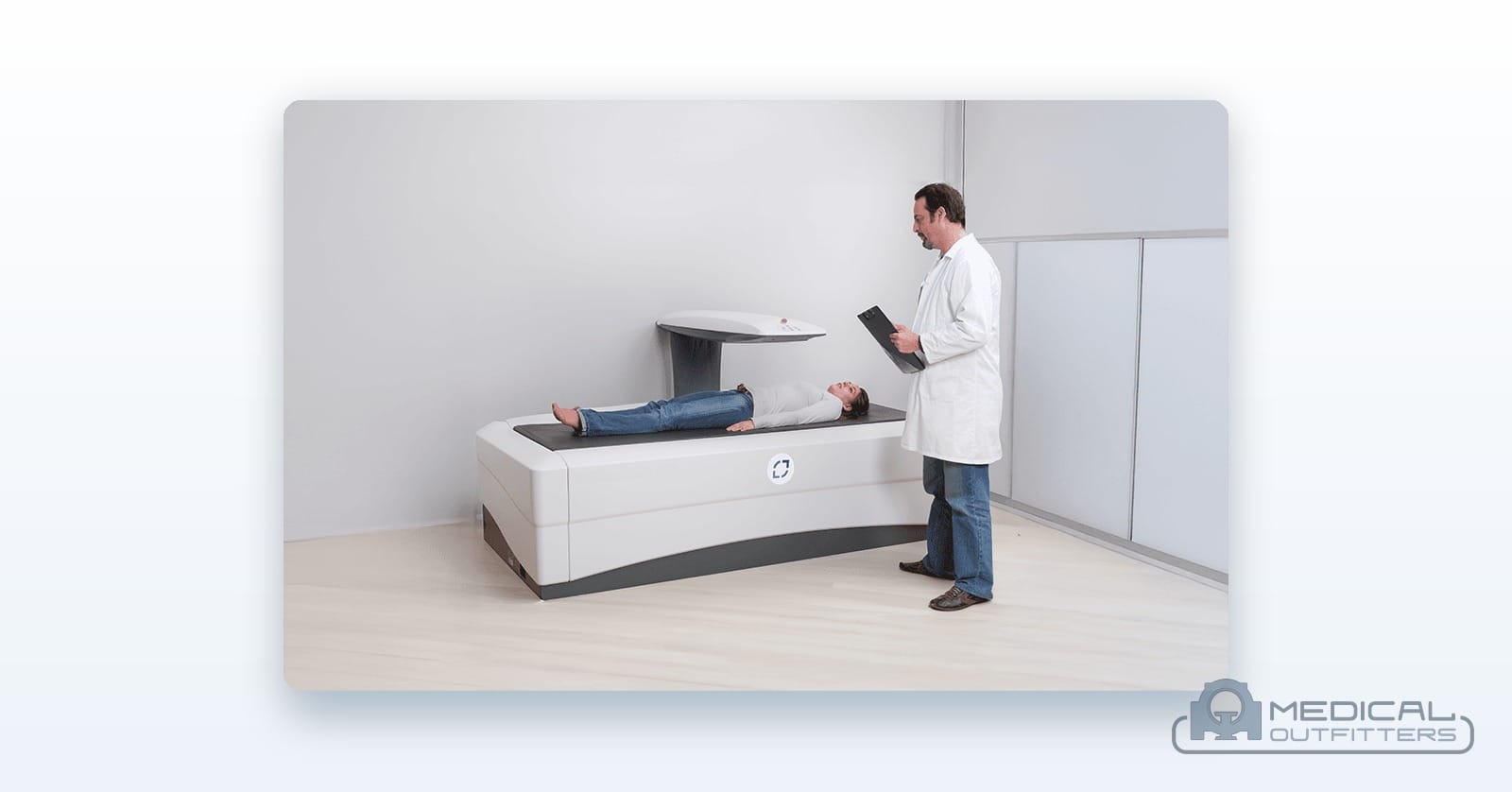 DMS Imaging Stratos DR bone densitometer with a patient on the table, a new DEXA scanner sold by Medical Outfitters
