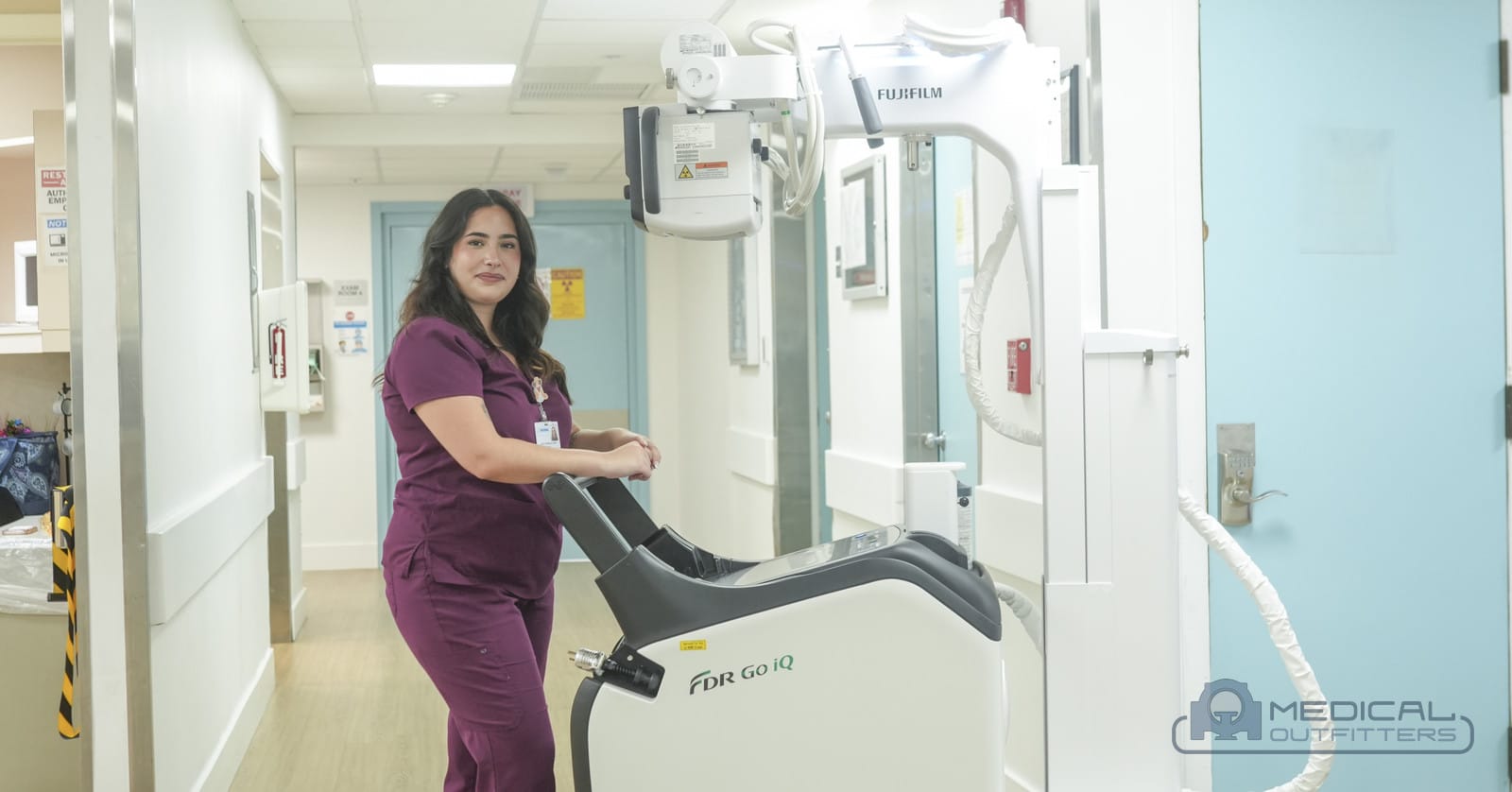 Radiologic technologist with the Fujifilm FDR Go iQ mobile digital X-ray system in a corridor at Larkin Community Hospital, Palm Springs Campus, during the Medical Outfitters demonstration