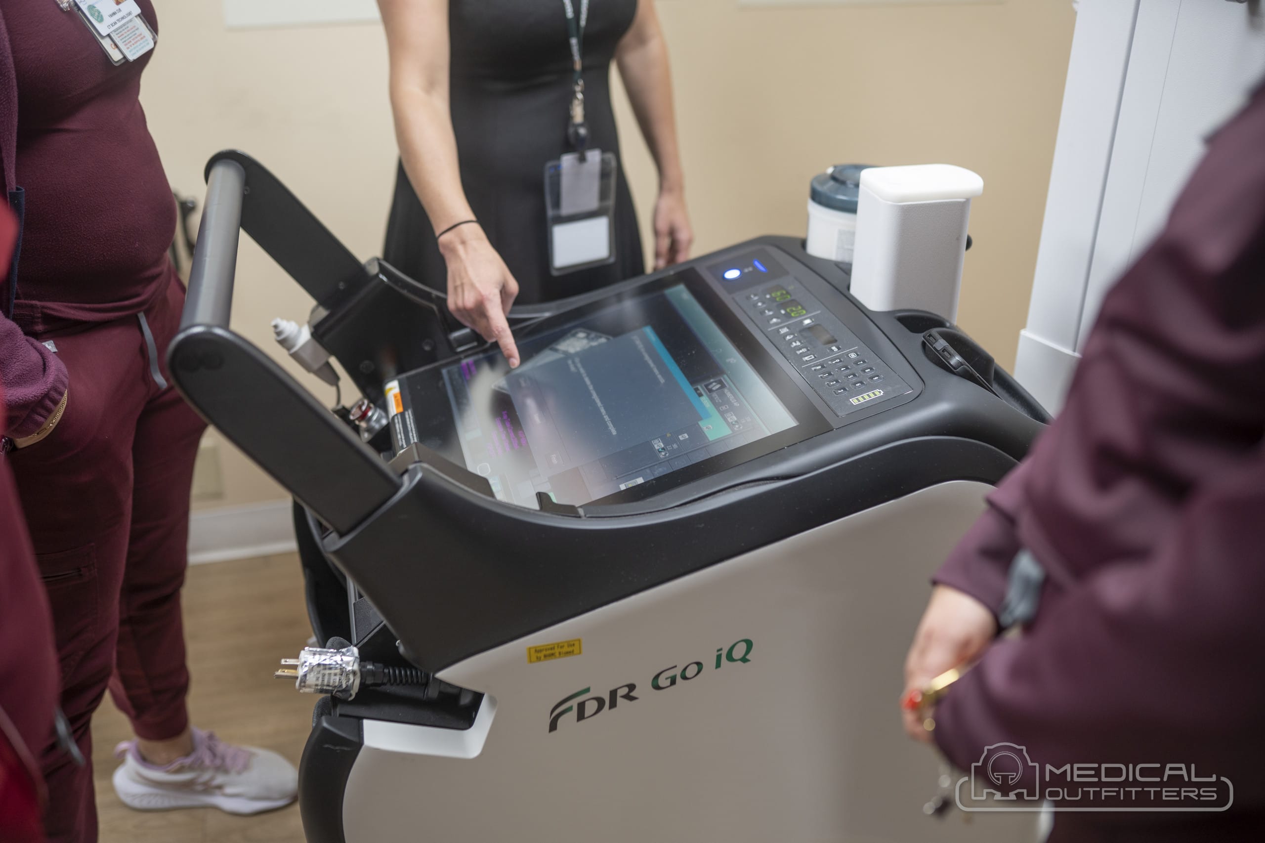 Close-up of the Fujifilm FDR Go iQ 19-inch touchscreen console being demonstrated to Larkin Community Hospital imaging staff