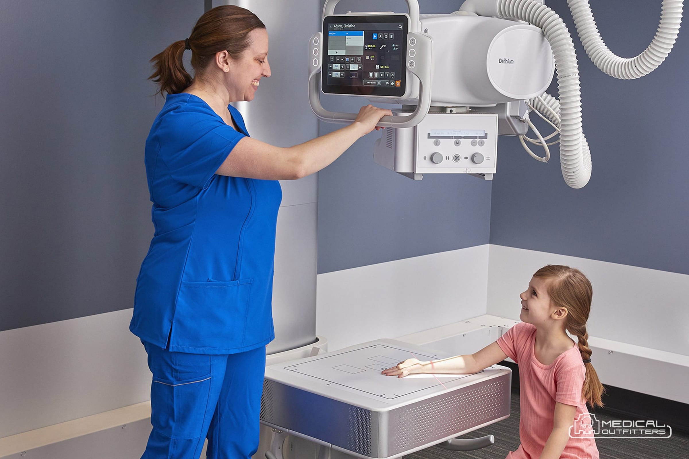 GE Definium X-Ray: Definium 656 HD in use, photo courtesy of GE HealthCare, with the Medical Outfitters watermark