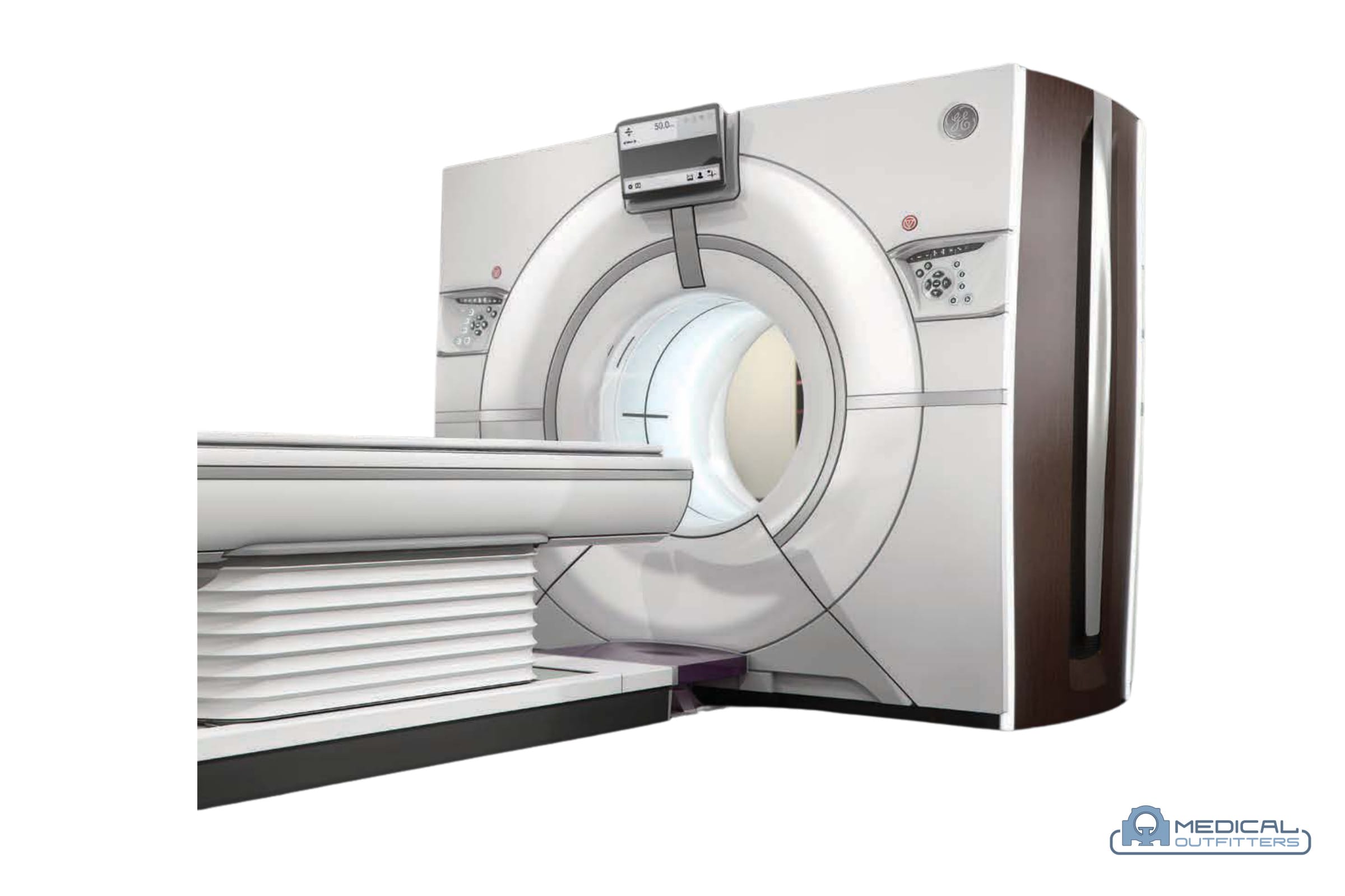 GE Revolution CT: Revolution CT, angled view with the patient table, photo courtesy of GE HealthCare, with the Medical Outfitters watermark
