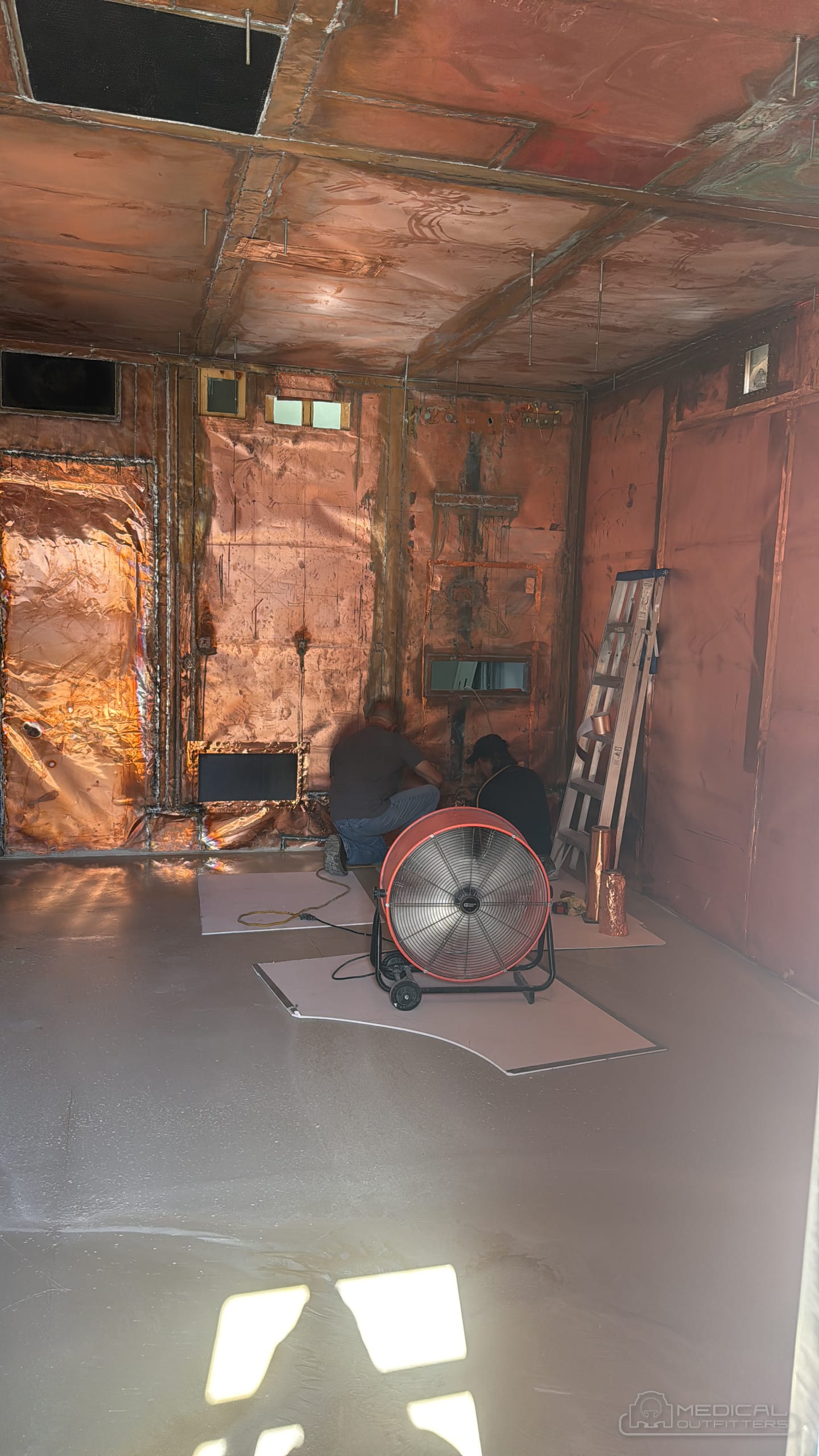 Copper RF shield panels inside an MRI magnet room under construction on a Medical Outfitters installation