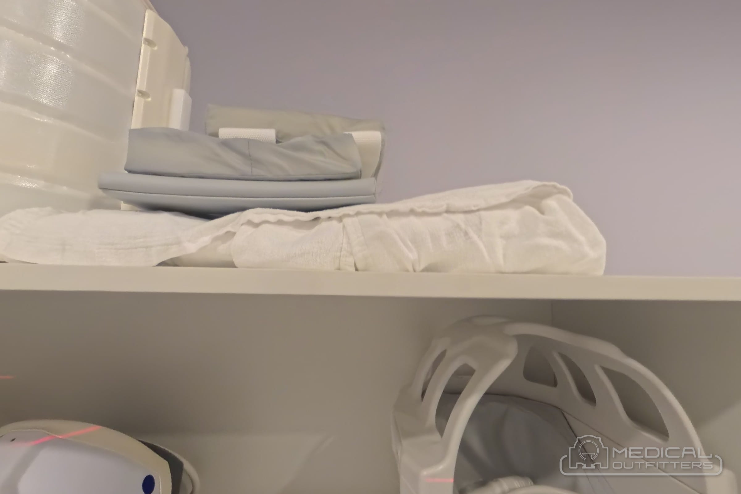 New MRI receive coils stored on the shelf of a Fujifilm APERTO Lucent suite installed by Medical Outfitters