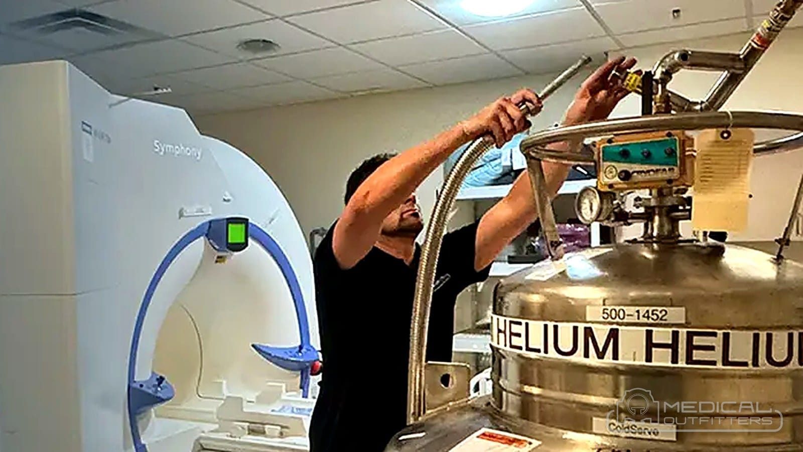 MRI helium fill in progress with a cryogenic helium dewar beside the magnet during a Medical Outfitters cryogenic service visit