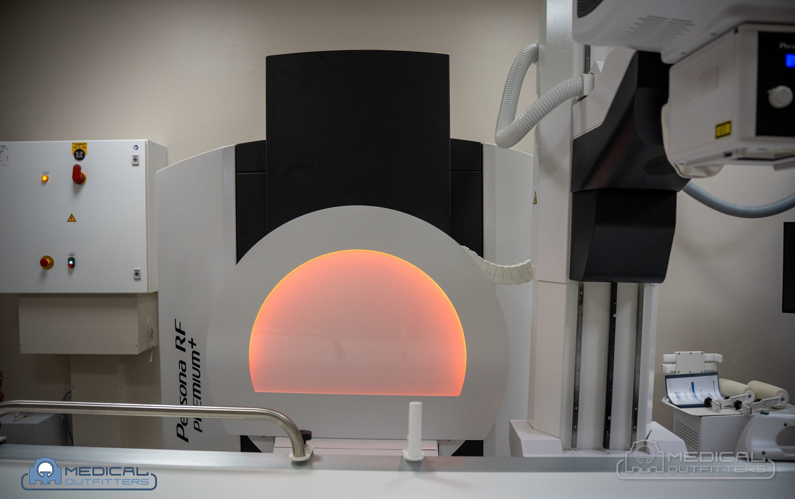 Fujifilm Persona RF PREMIUM+ column with its ambient light ring glowing red at Centro Cardiovascular de Puerto Rico y del Caribe, with the Medical Outfitters watermark